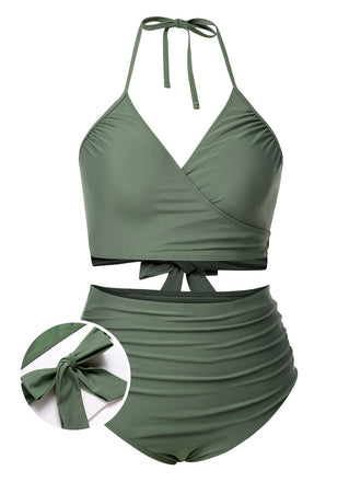 She's wearing Green Grey 1930s Halter Strappy Tankini Swimsuit and the whole beach remembers the 1930s