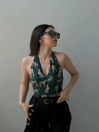 Front view: vintage Green Jaguar Vintage Halter One-piece Swimsuit, perfect for vintage themed parties and retro fashion enthusiasts