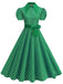 Vintage polka dot belted swing dress with shirt collar in classic 1950s retro style