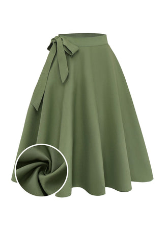 Green skirt with a tie waist on a white background
