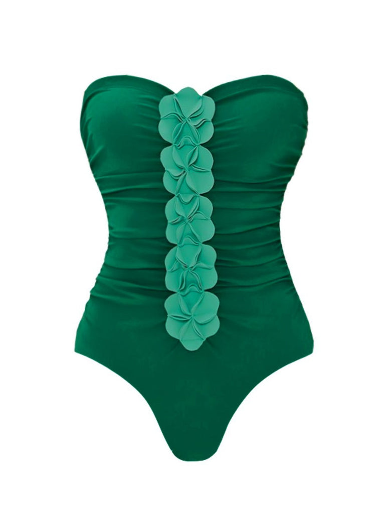 Green strapless swimsuit with floral details on a white background
