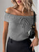 She pairs this Grey 1950s Off-Shoulder Knitted Top with confidence and 1950s charm