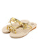 She's wearing Khaki Butterfly Beach Flat Sandals and the whole beach remembers the vintage