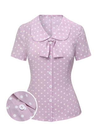 She pairs this Lavender 1940s Polka Dots Lapel Blouse with confidence and 1940s charm