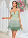 Green layered tulle dress front view with tiered ruffled skirt