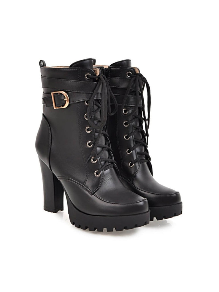 She pairs this Leather High Top Chunky Heel Martin Boots with confidence and vintage charm