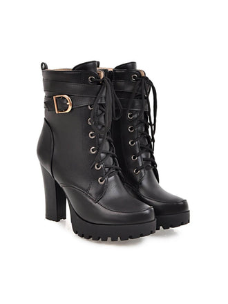 She pairs this Leather High Top Chunky Heel Martin Boots with confidence and vintage charm