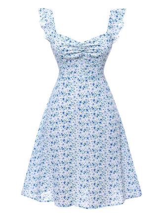 She slips into this Light Blue 1950s Ruffles Strap Ditsy Floral Dress and suddenly it's a 1950s daydream