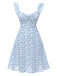 She slips into this Light Blue 1950s Ruffles Strap Ditsy Floral Dress and suddenly it's a 1950s daydream