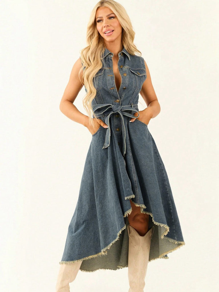 Woman wearing a denim dress with a white background