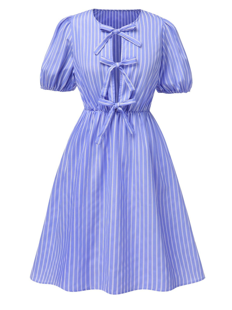 She slips into this Light Blue 1950s Striped Bow Lace-Up Dress and suddenly it's a 1950s daydream