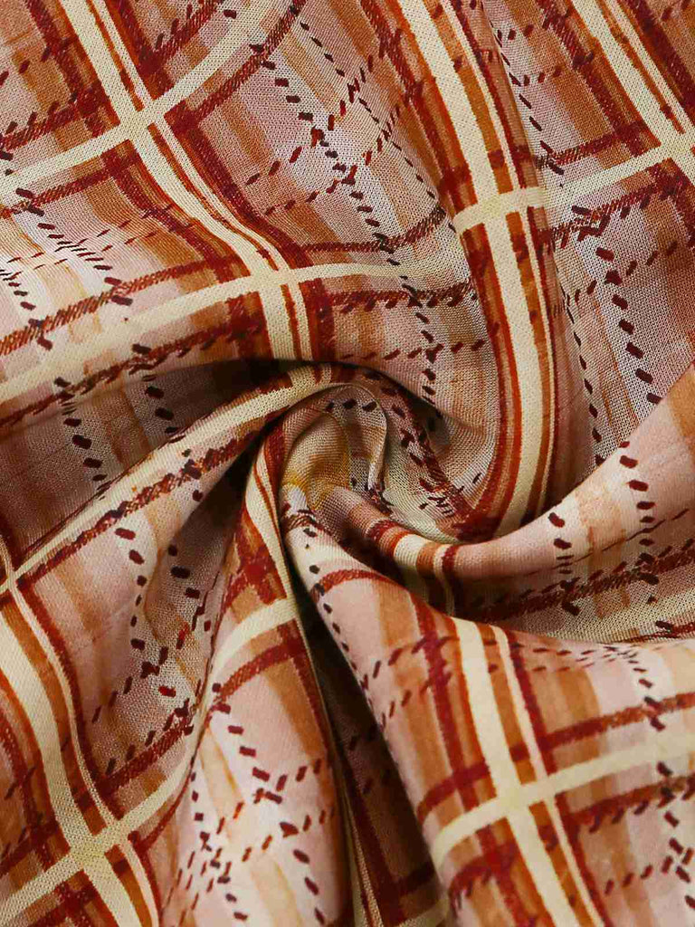 Close-up of plaid fabric with brown and beige colors