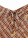 Plaid patterned fabric with a knot and yellow accents on a white background