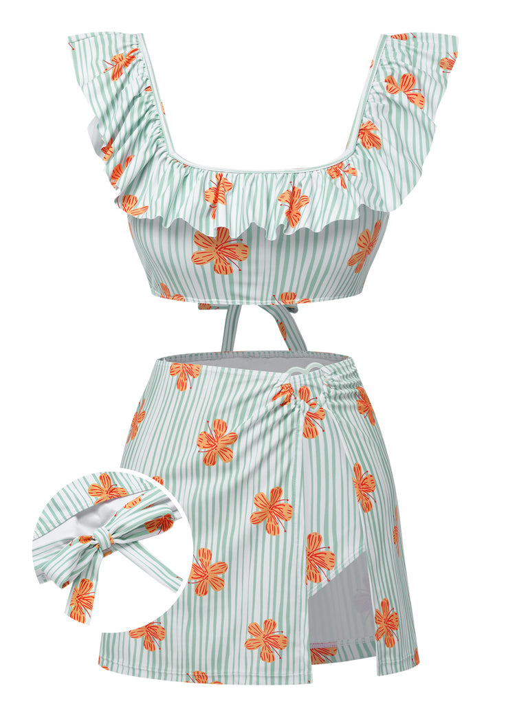 She's wearing Light Green 1950s Floral Stripe Swimsuit & Skirt Cover-Up and the whole beach remembers the 1950s
