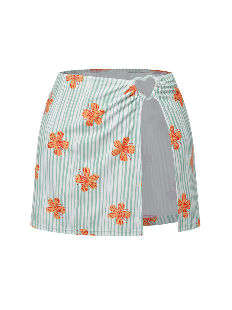 She's wearing Light Green 1950s Floral Stripe Swimsuit & Skirt Cover-Up and the whole beach remembers the 1950s