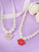 She adds this Lips Pendant Vintage Necklace and suddenly it's 1950s perfection