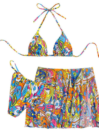 She's wearing Multicolor 1960s Cartoon Prints Halter Bikini Set and the whole beach remembers the 1960s