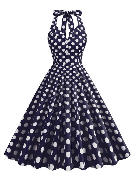 navy blue polka dot dress Grace Maxi a small handbag and pretty pearl jewellery. Retro Stage 1950s Polka Dot