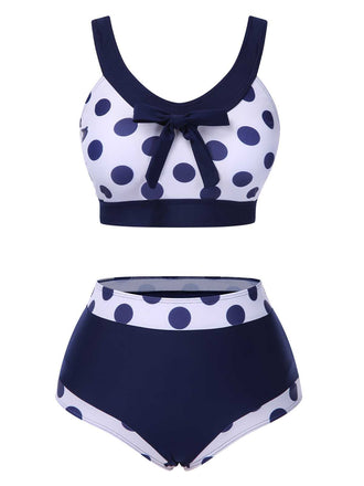 She's wearing Navy Blue 1950s Polka Dots High-Waist Swimsuit and the whole beach remembers the 1950s