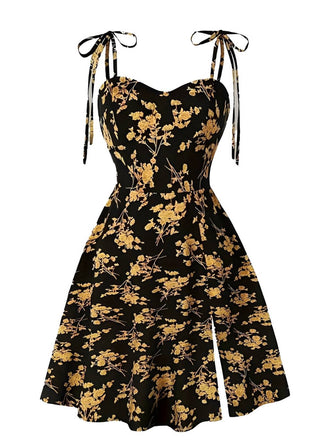 She slips into this Orange 1940s Ditsy Floral Spaghetti Strap Lace-Up Dress and suddenly it's a 1940s daydream