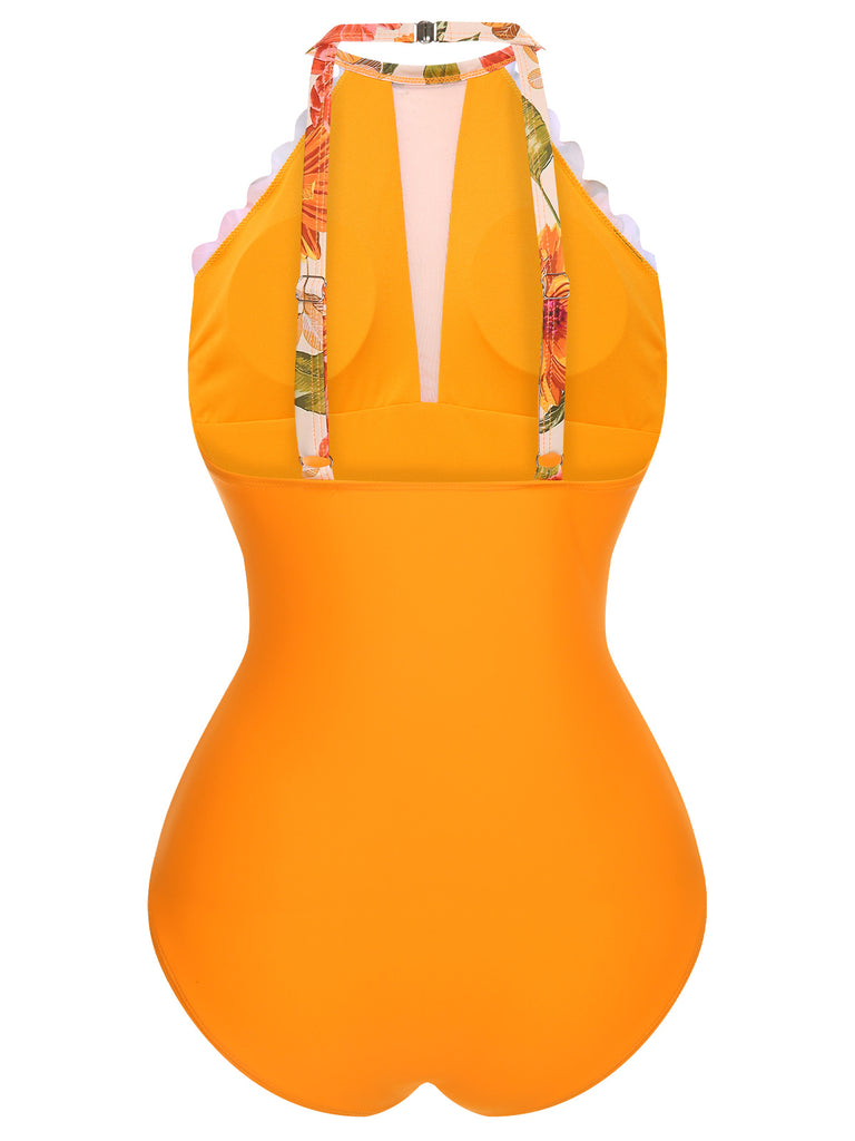 This Orange 1960s Halter Floral One-Piece Swimsuit carries 1960s vacation dreams in every stitch