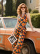 Orange 1970s Halter Geometric Print Jumpsuit, vintage romper, retro jumpsuit - perfect for women who love vintage and retro fashion
