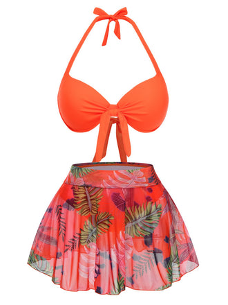 She's wearing Orange Red 1940s Tropical Plants Halter Swimsuit and the whole beach remembers the 1940s