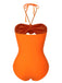 This Orange Red 1950s Halter 3D Flower One-Piece Swimsuit carries 1950s vacation dreams in every stitch