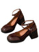 This PU Leather Patchwork Square Toe Chunky Heels whispers vintage secrets to those who notice