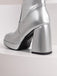 She finds her vintage story in this Patent Leather Round Toe Solid High Heel Boots