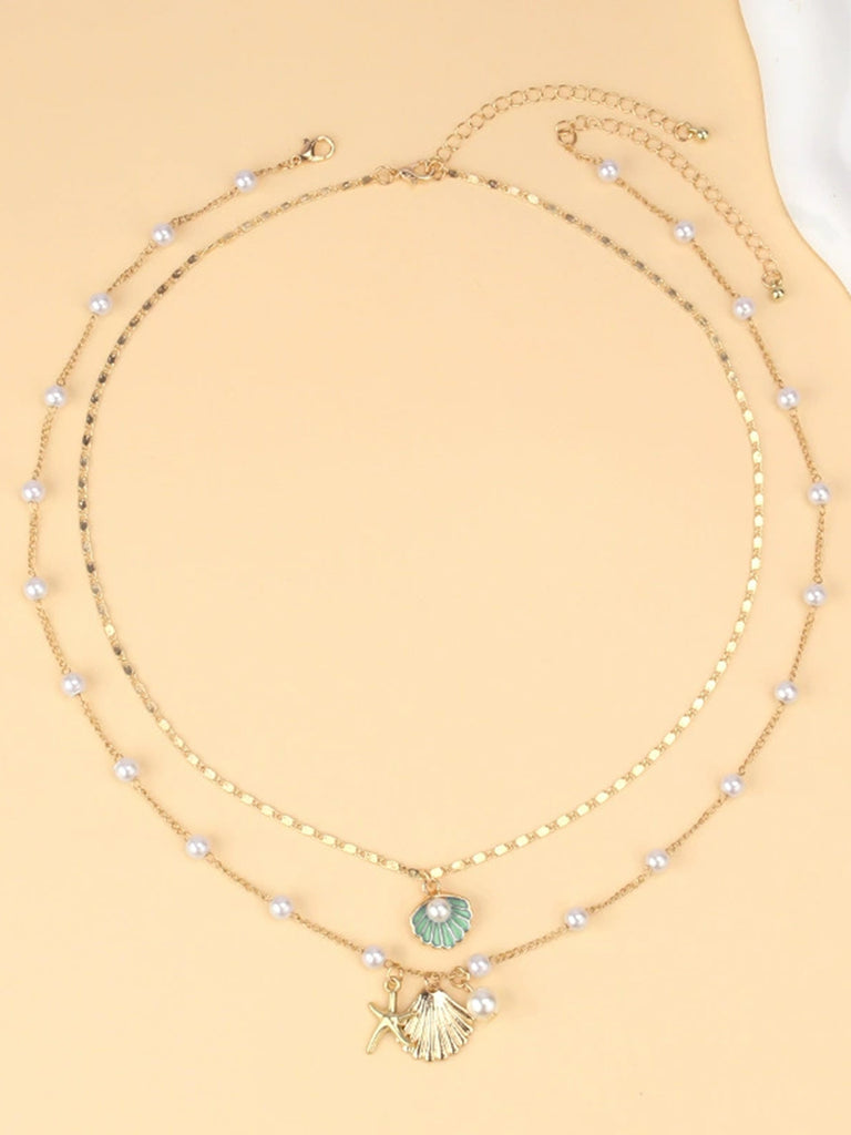 Pentagram Shell Necklace: vintage detail work for the woman who notices