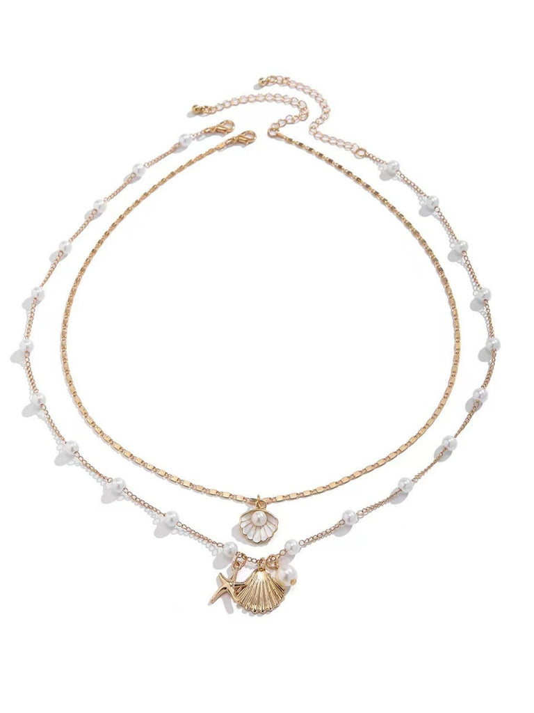 Pentagram Shell Necklace — vintage elegance in the palm of her hand