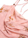 This Pink 1930s Halter Strap Floral Satin Dress wraps her in 1930s elegance, one twirl at a time