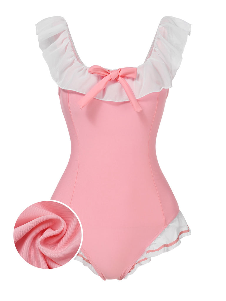 She's wearing Pink 1950s Bowknot Lapel One-Piece Swimsuit and the whole beach remembers the 1950s