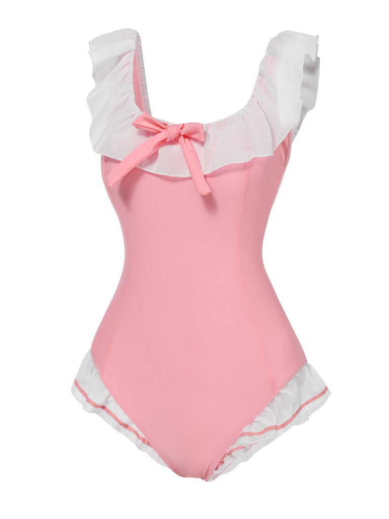 This Pink 1950s Bowknot Lapel One-Piece Swimsuit carries 1950s vacation dreams in every stitch