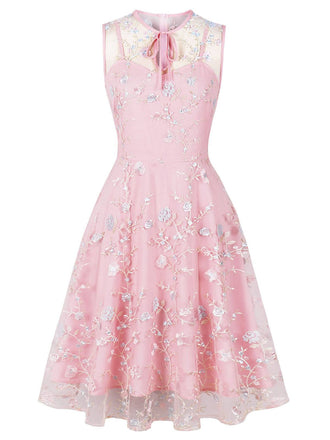 She slips into this Pink 1950s Floral Embroidered A-Line Sleeveless Dress and suddenly it's a 1950s daydream