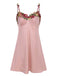 She slips into this Pink 1950s Flower Embroidered Suspender Nightgown and suddenly it's a 1950s daydream