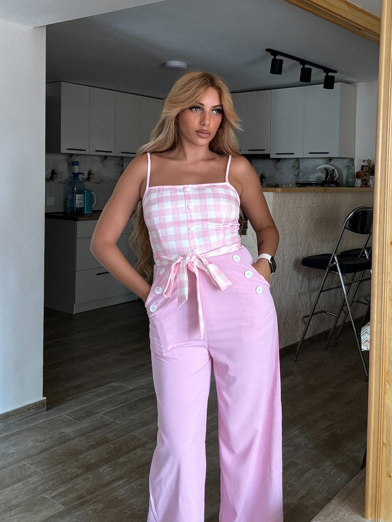 She finds her 1950s story in this Pink 1950s Gingham Plaid Suspender Jumpsuit