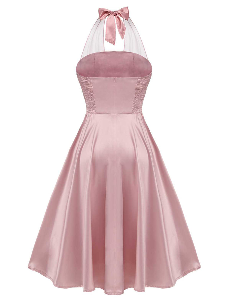 Pink 1950s Halloween Bloodstain Halter Dress — vintage elegance for the modern woman