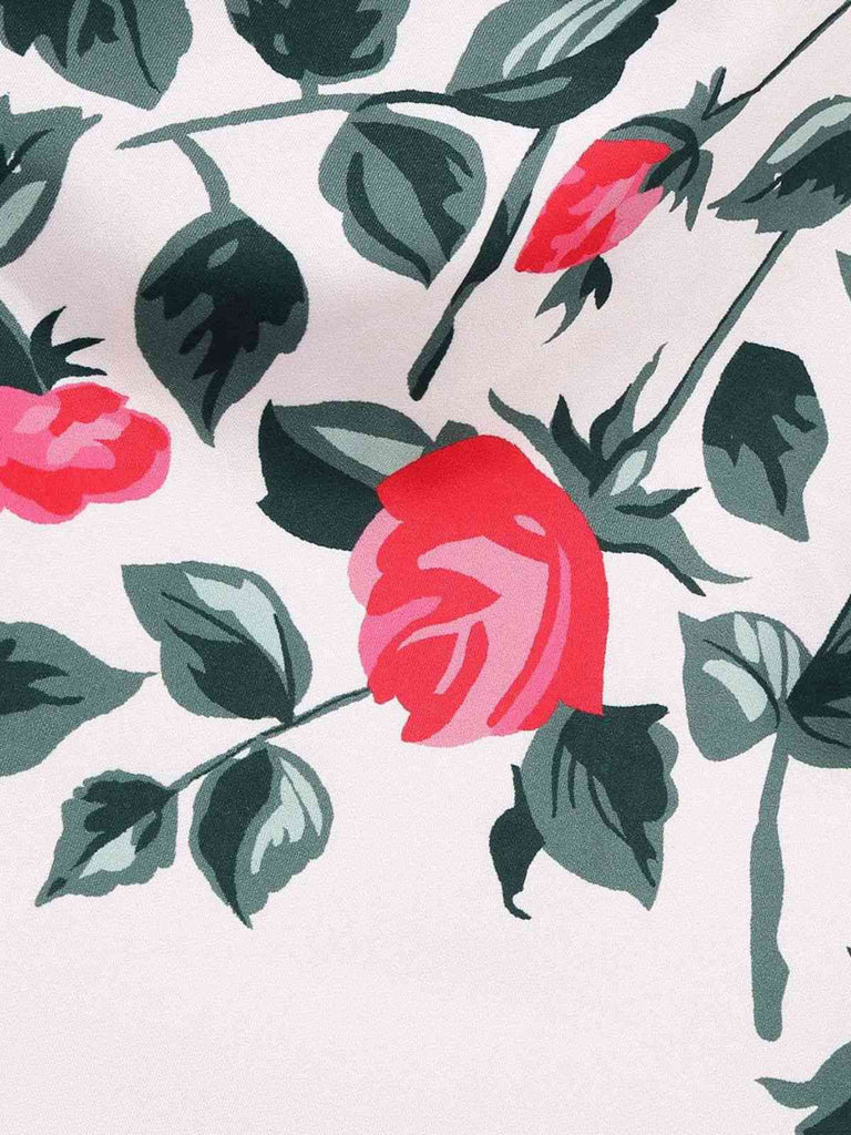 Floral pattern with pink and red roses on a light background