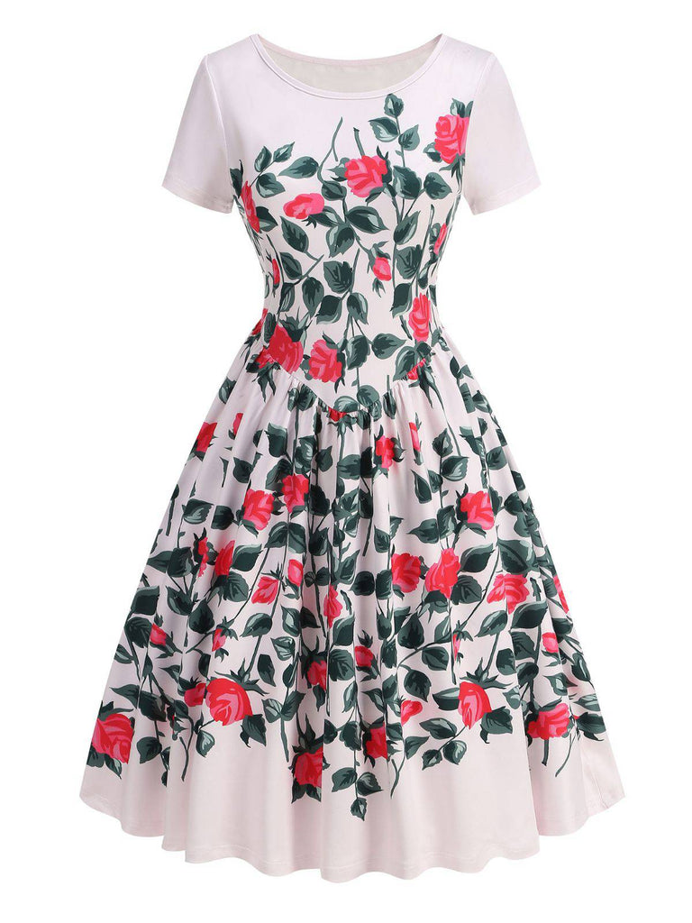 White dress with red floral pattern on a white background