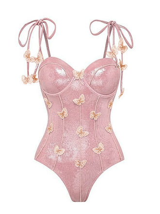 She's wearing Pink 1950s Shimmery 3D Butterflies One-Piece Swimsuit and the whole beach remembers the 1950s