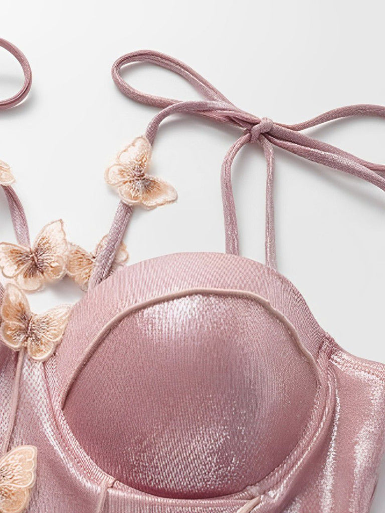 This Pink 1950s Shimmery 3D Butterflies One-Piece Swimsuit carries 1950s vacation dreams in every stitch