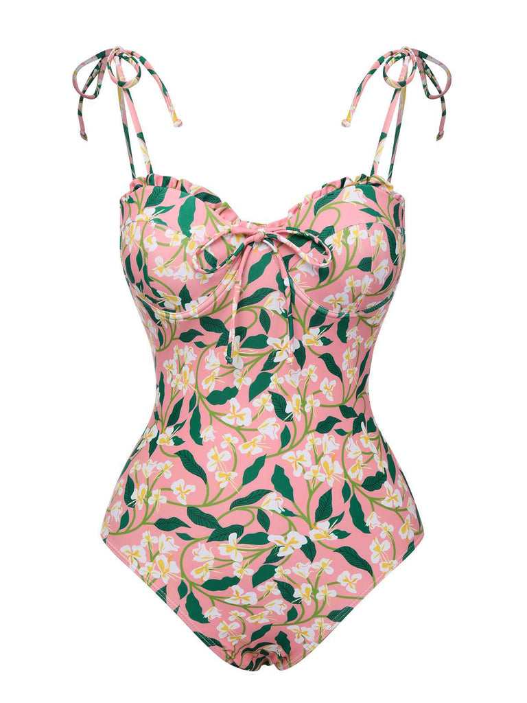 She's wearing Pink 1950s Spaghetti Strap Plants Print Swimsuit and the whole beach remembers the 1950s