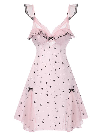 She slips into this Pink 1960s Deep-V Hearts Lace Sling Nightgown and suddenly it's a 1960s daydream