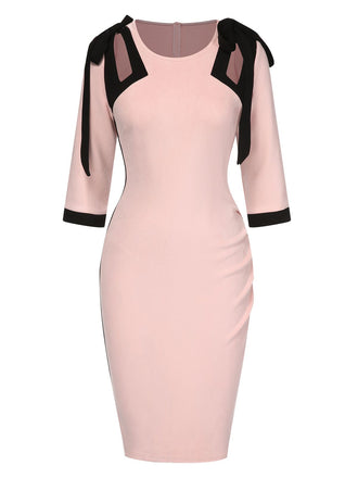 She slips into this Pink 1960s Patchwork Pencil Dress and suddenly it's a 1960s daydream