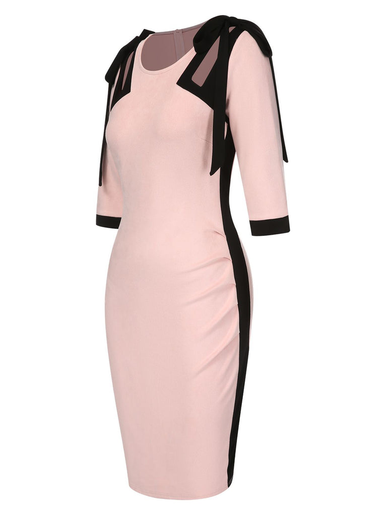 This Pink 1960s Patchwork Pencil Dress wraps her in 1960s elegance, one twirl at a time