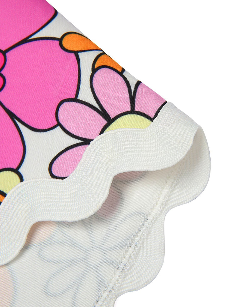 She slips into this Pink 1960s V-Neck Cartoon Flowers Pencil Dress and suddenly it's a 1960s daydream