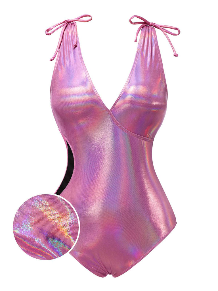 She's wearing Pink 1970s Bow Deep V Gloss Hollow Swimsuit and the whole beach remembers the 1970s
