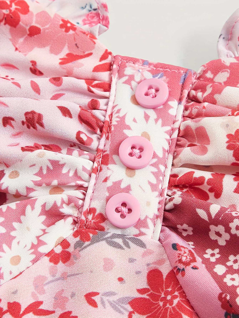 This Pink 1980s Spaghetti Strap Ditsy Floral Tiered Dress wraps her in 1980s elegance, one twirl at a time